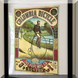 A18. Framed Columbia Bicycle print. 